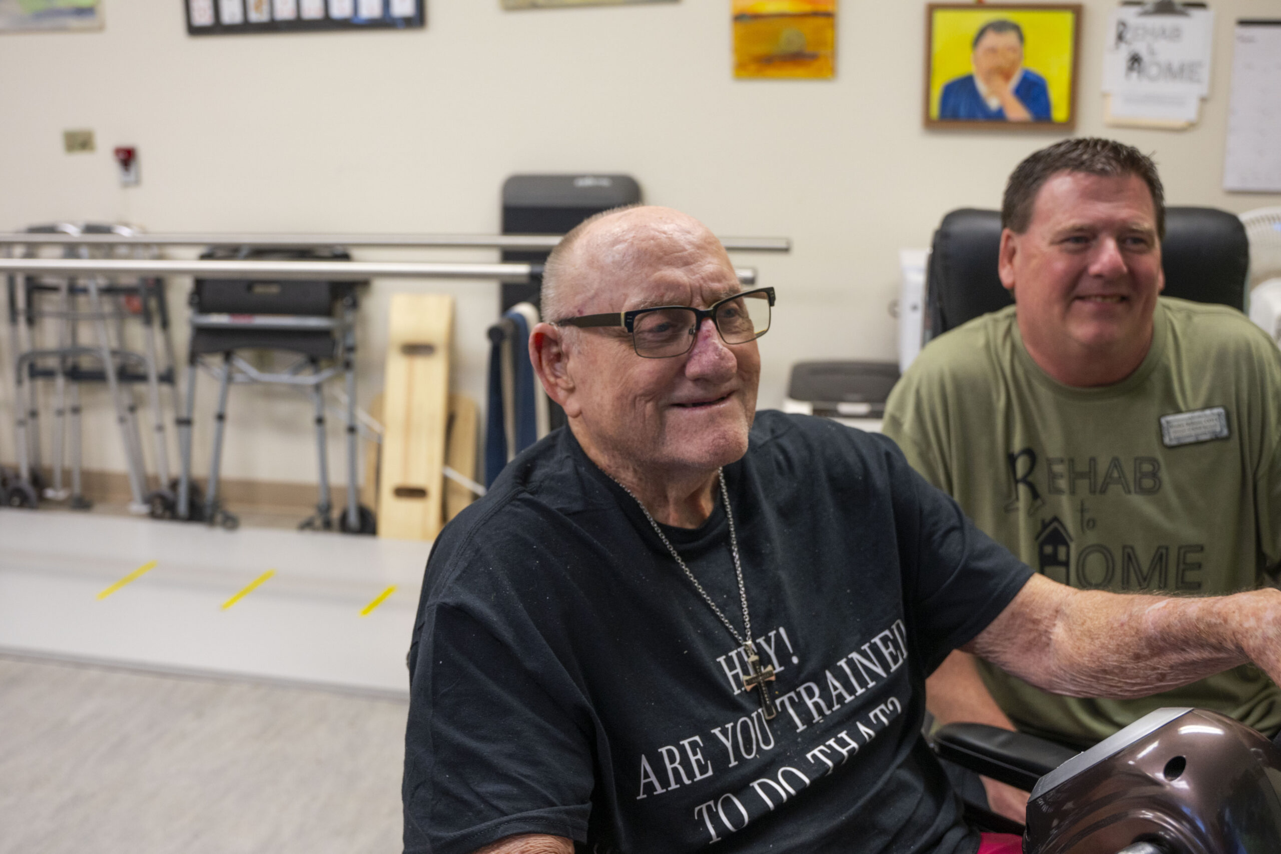 Resident and therapist smiling at kent county nursing home